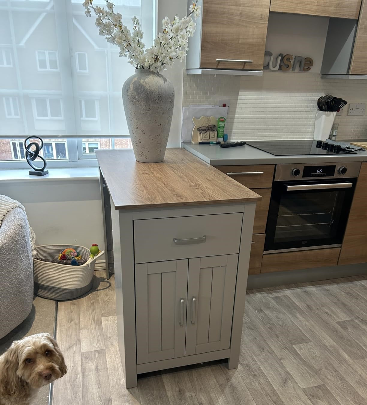 Grey breakfast bar table with storage drawer and cabinet