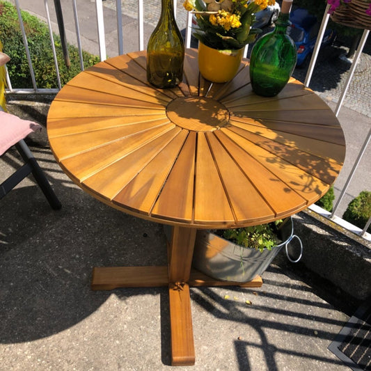wooden round garden table with pedestal base