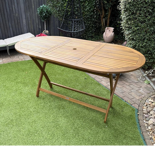 garden dining table with oval shape and foldable design