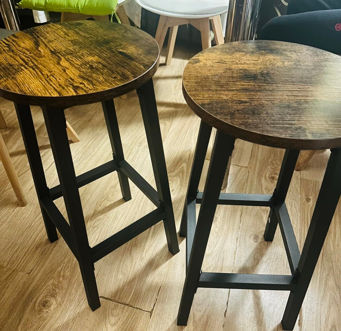 wooden table set with stools in round shape