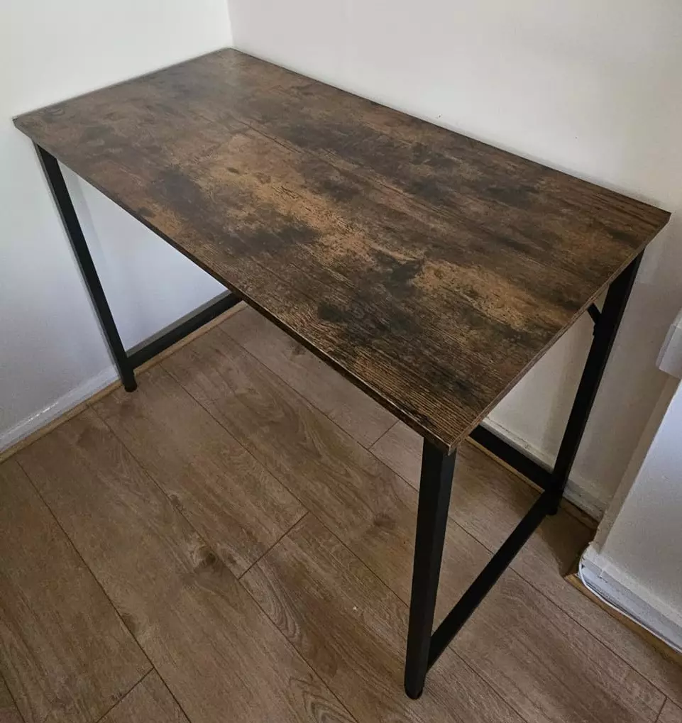 Industrial computer desk with rustic wood tabletop and steel frame