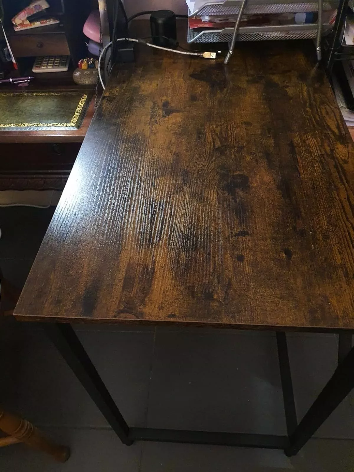 Home office desk with sturdy steel frame and rustic wood top