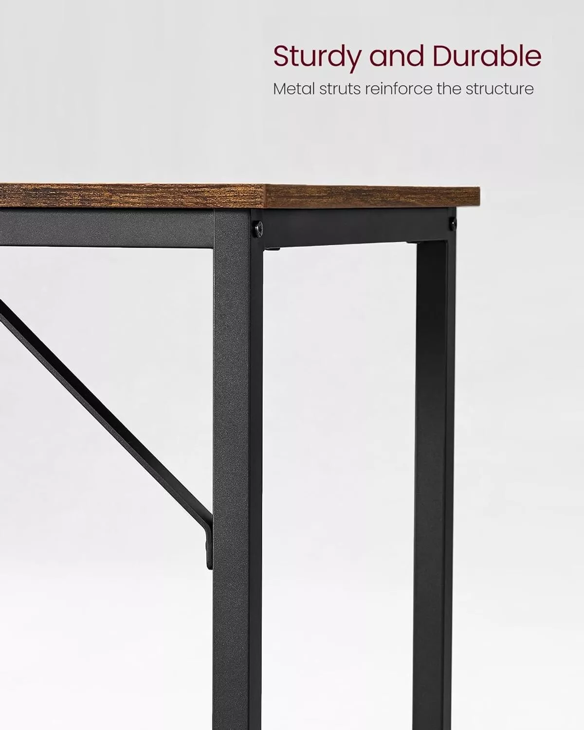 Industrial workstation desk with dark wood tone top and steel legs