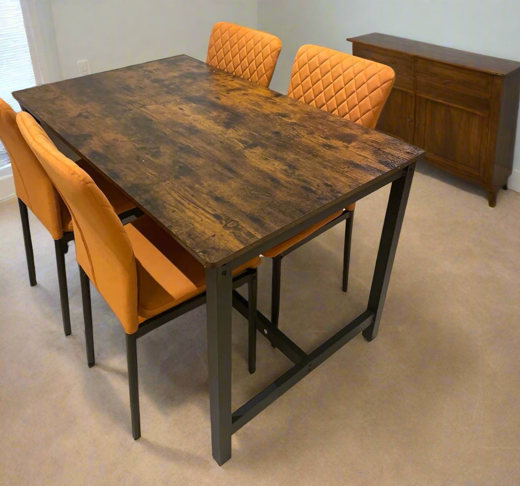 industrial dark wood dining table in a dinner room