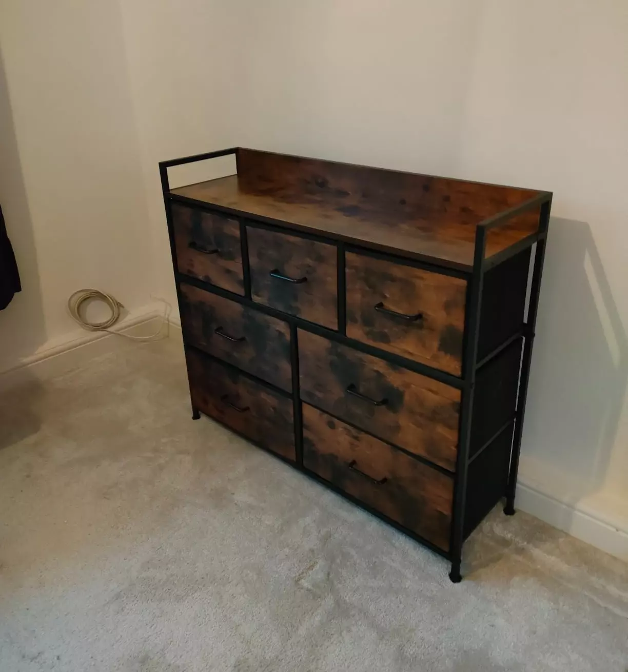 uniquely designed chest of drawers made from metal and MDF