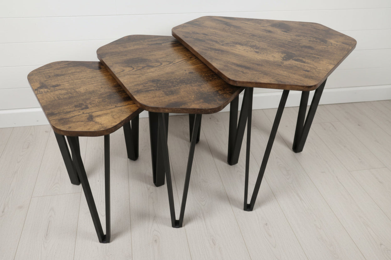 Stackable sofa side tables with hexagonal shape in industrial style