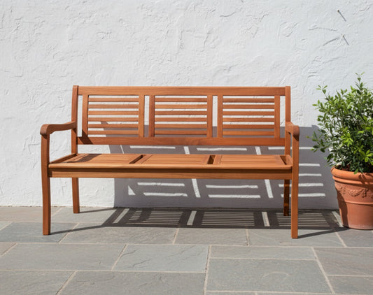 Wooden bench with slatted design for garden or patio