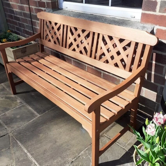 wooden garden bench on a garden