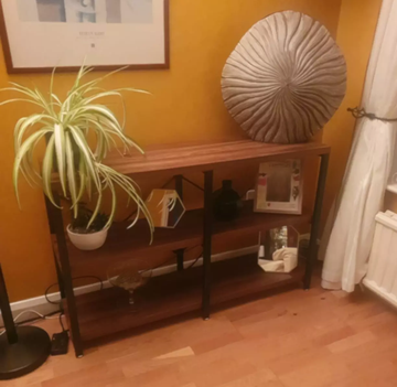 industrial console table with dark wood tone