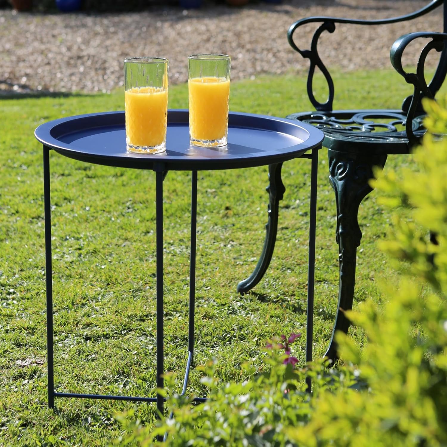metal folding table with serving tray top in round shape