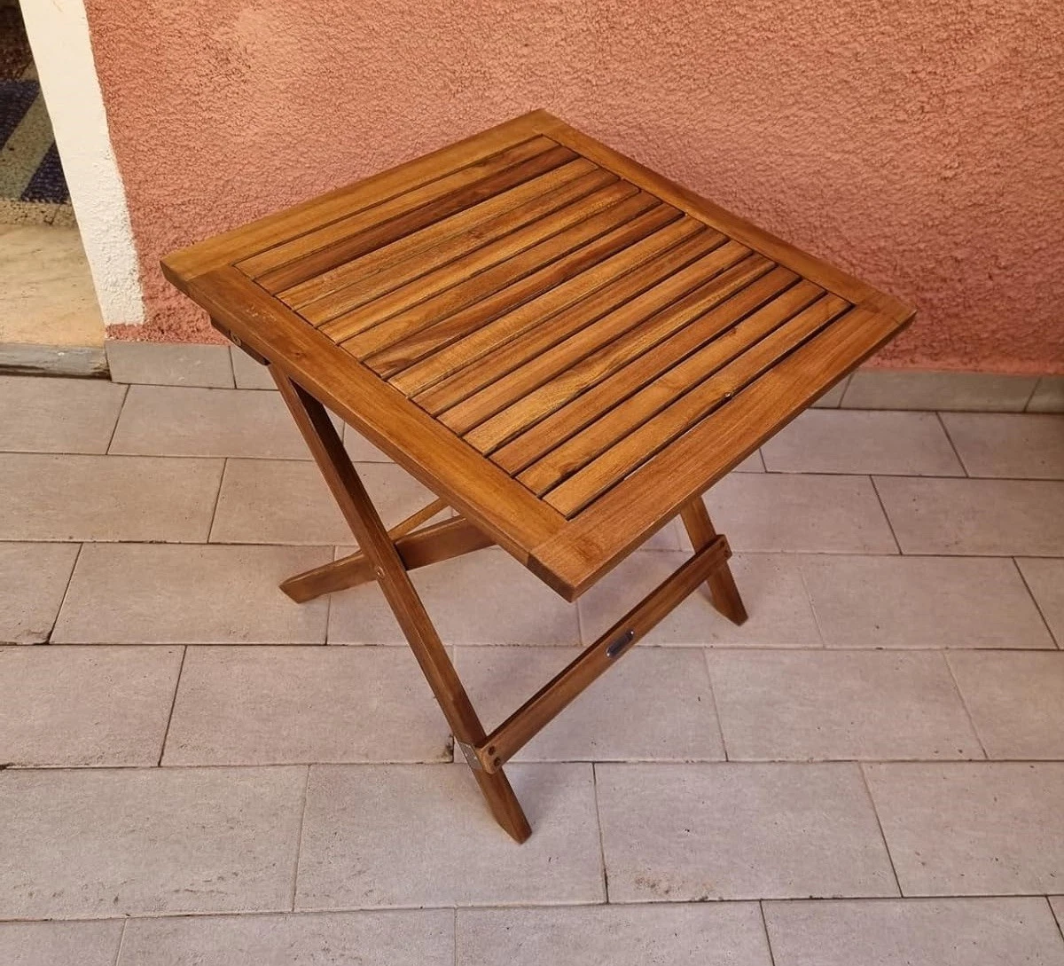Compact folding bistro table for balcony or garden use