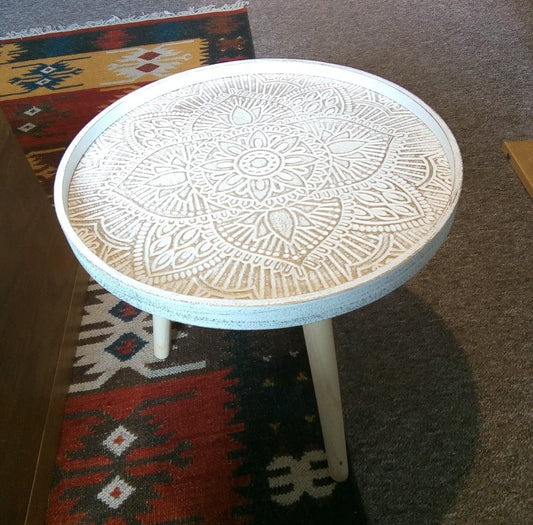 white rounded end coffee table with carvings