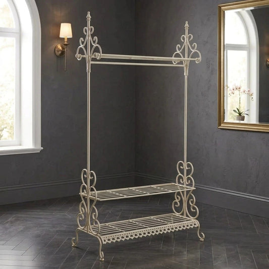 Vintage iron clothes rack with ornate French country design and shoe storage