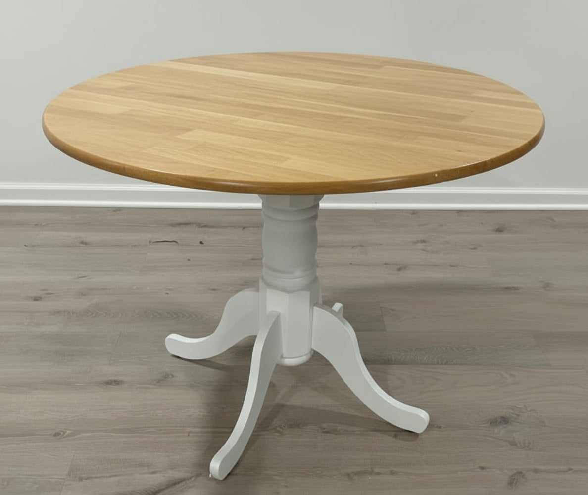 vintage dining table in round shape made from solid wood