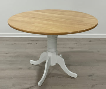 vintage dining table in round shape made from solid wood