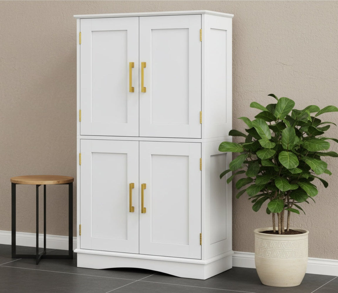 White freestanding kitchen larder unit with four doors and golden handles