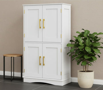 White freestanding kitchen larder unit with four doors and golden handles